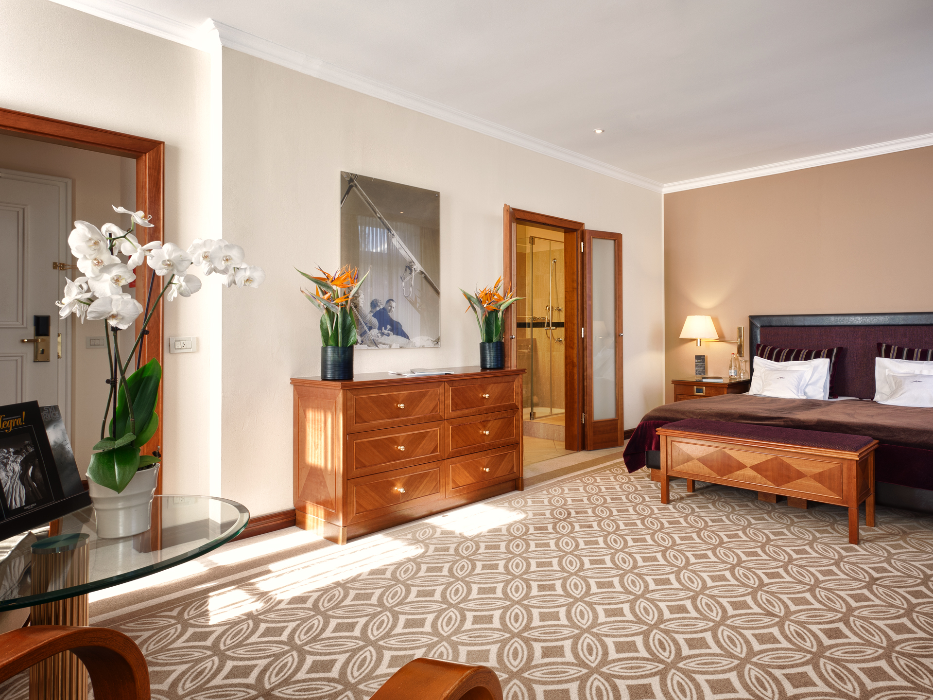 a bedroom with a bed and dresser