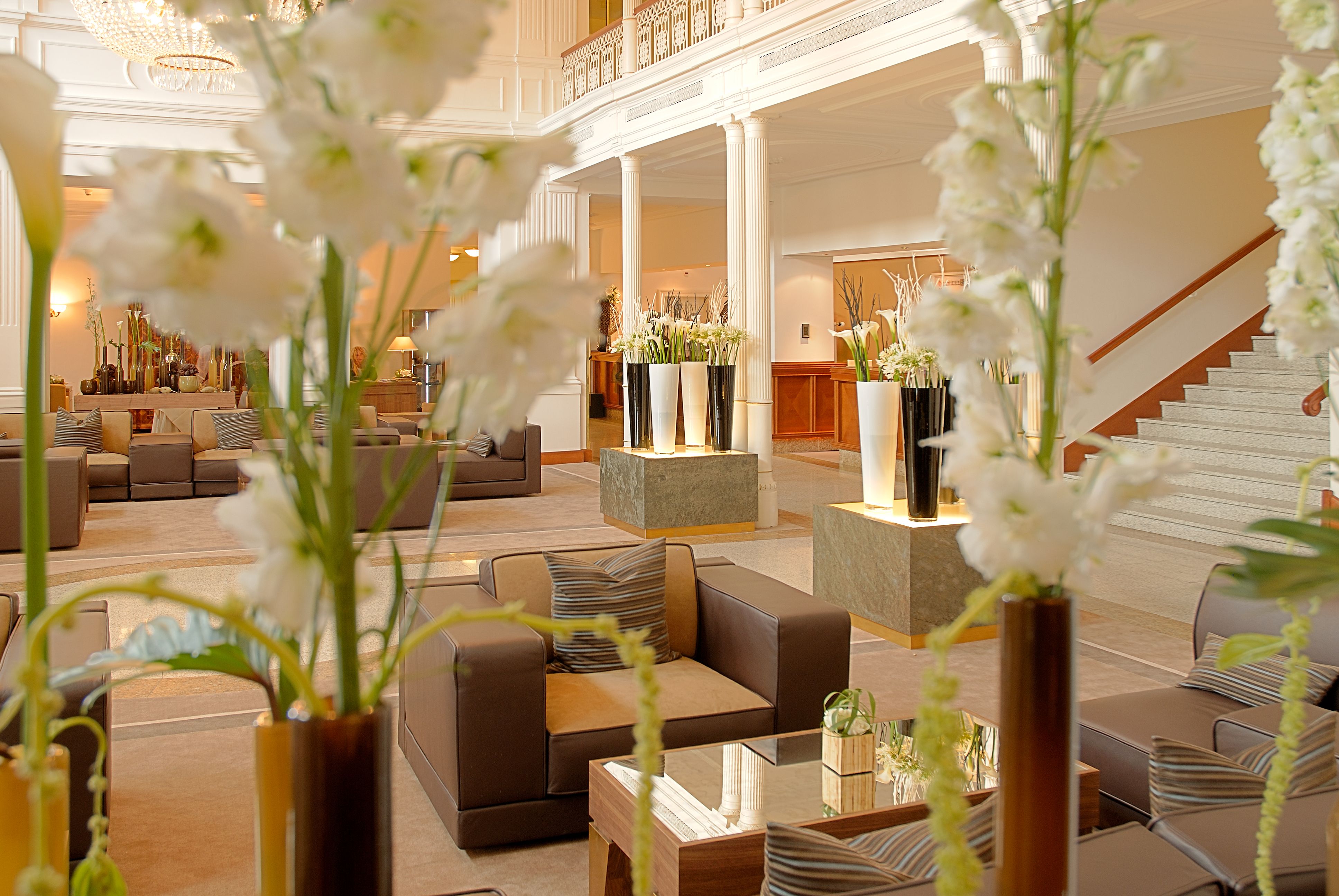 a large room with white flowers