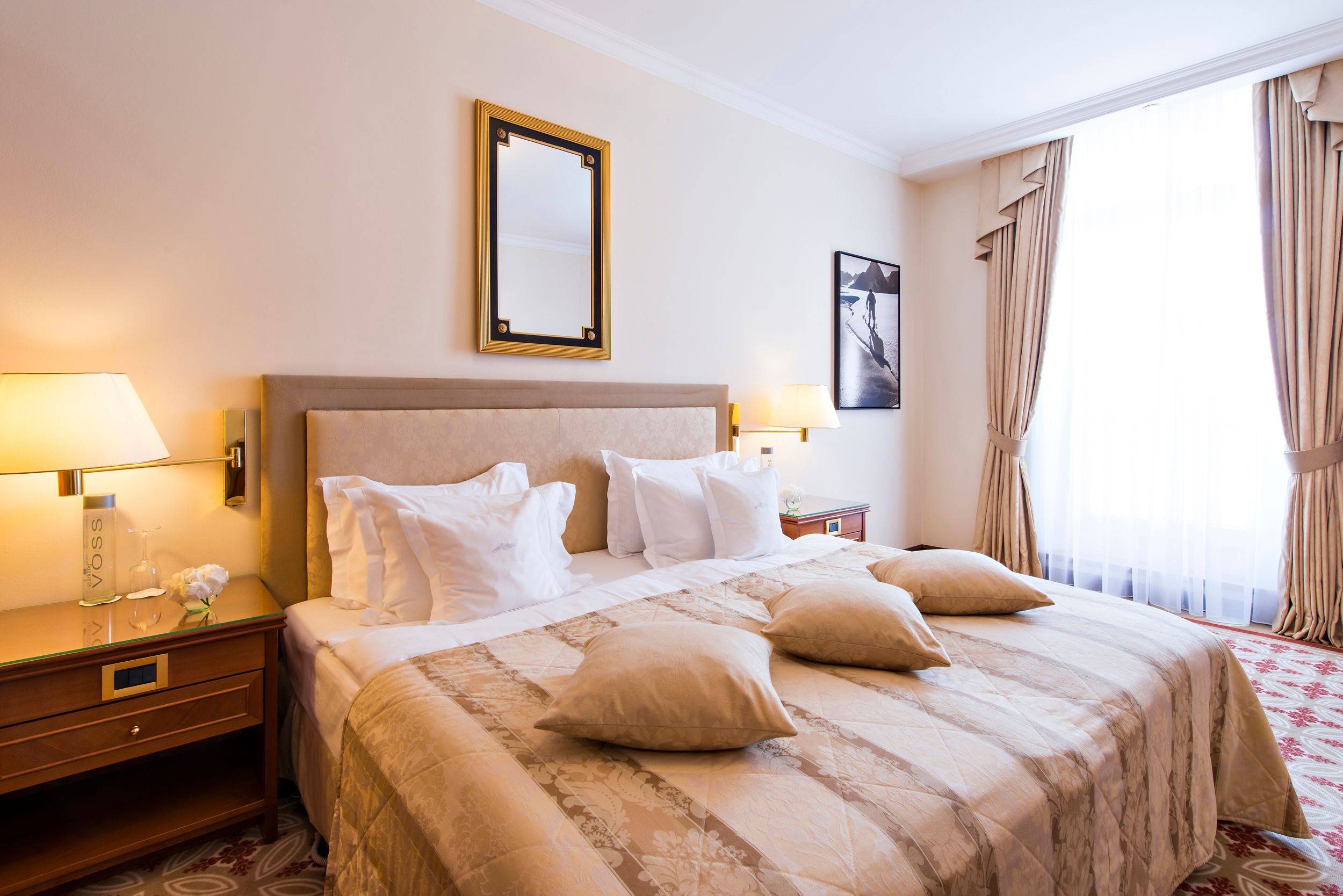 a bed with pillows on it