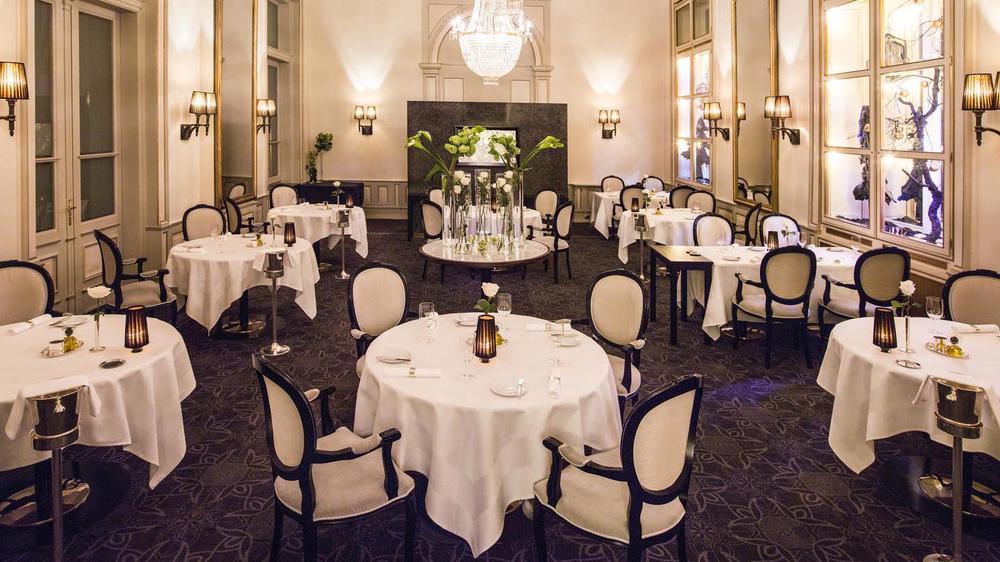 a room with tables and chairs