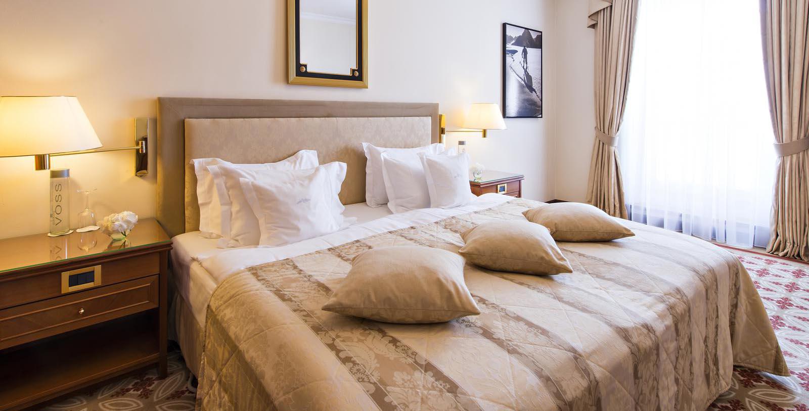 a bed with pillows on it