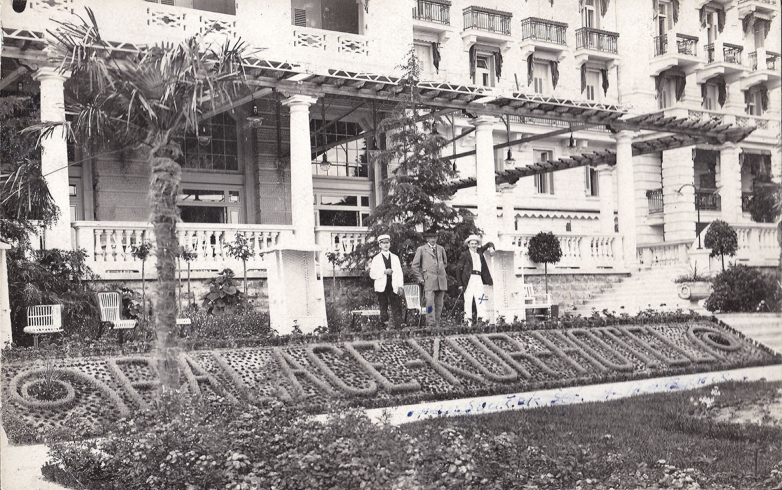 a group of people standing in front of a building