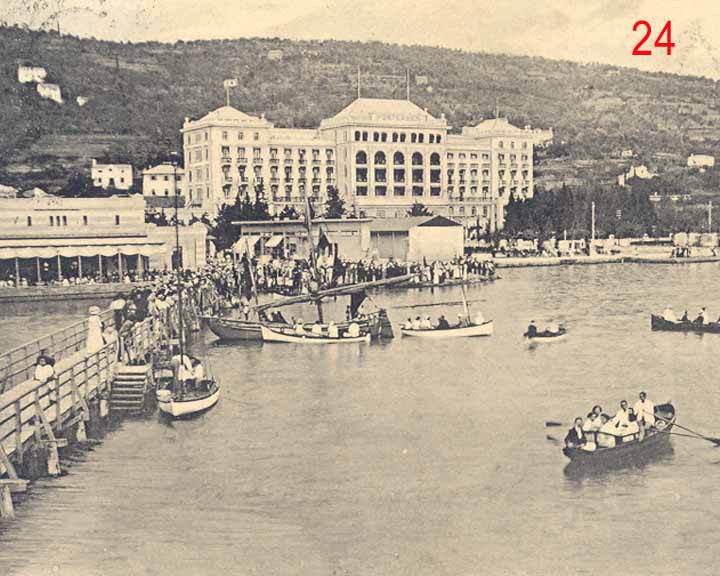 a group of people in boats on a body of water
