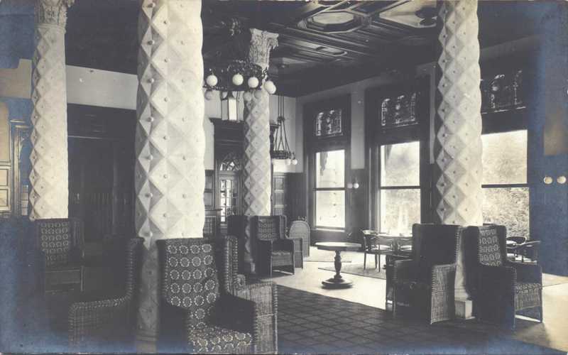 a room with chairs and a table