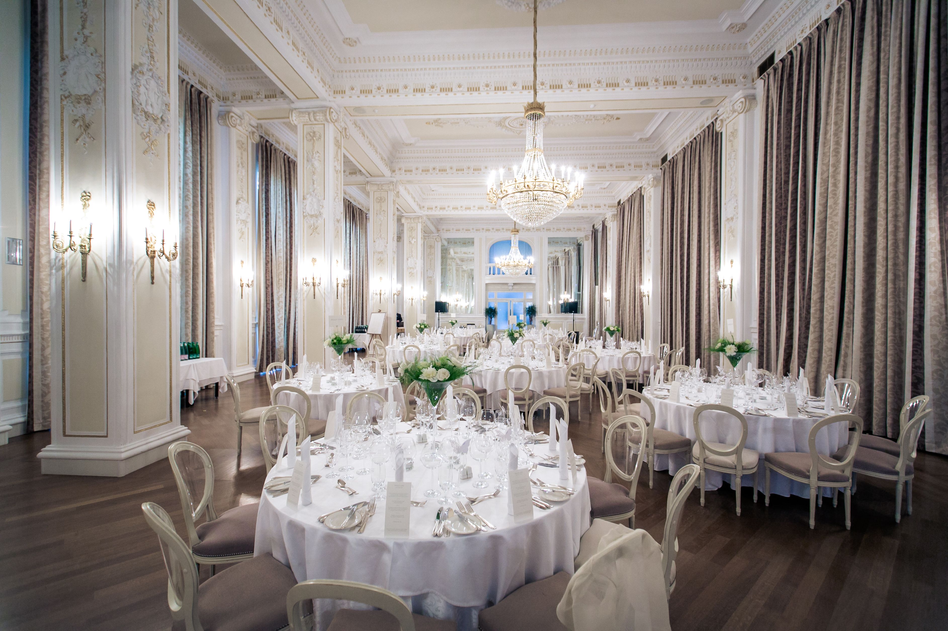 a room with tables and chairs