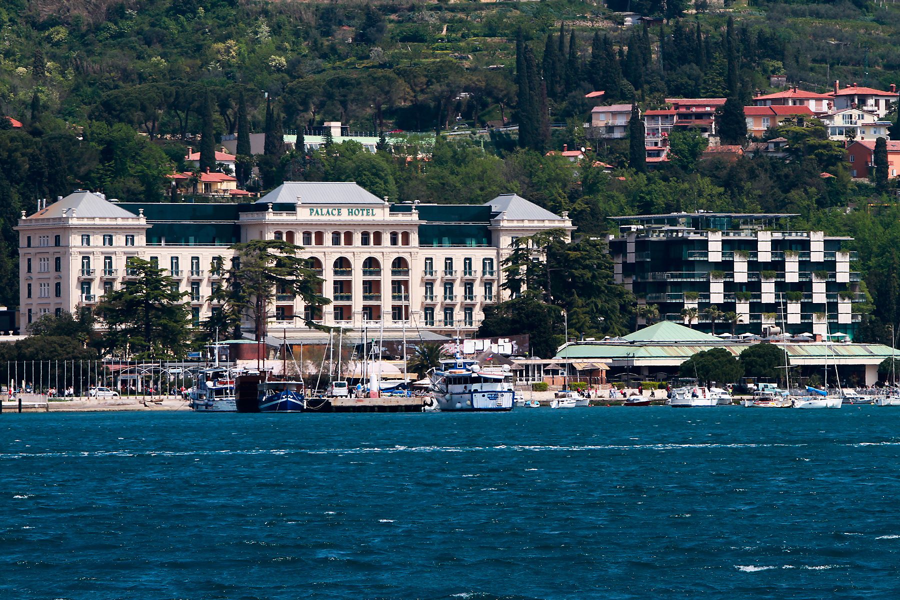 a large building next to a body of water