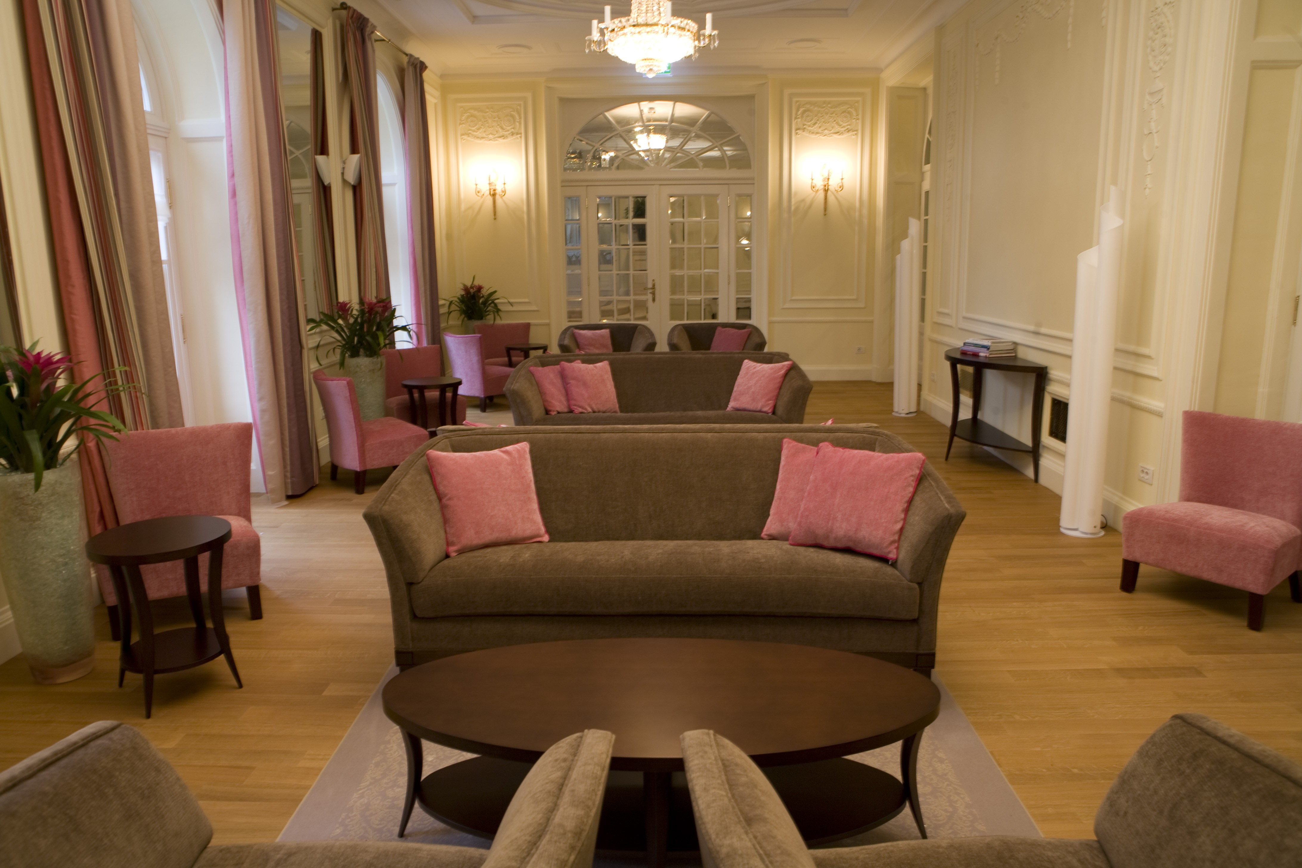 a room with couches and tables