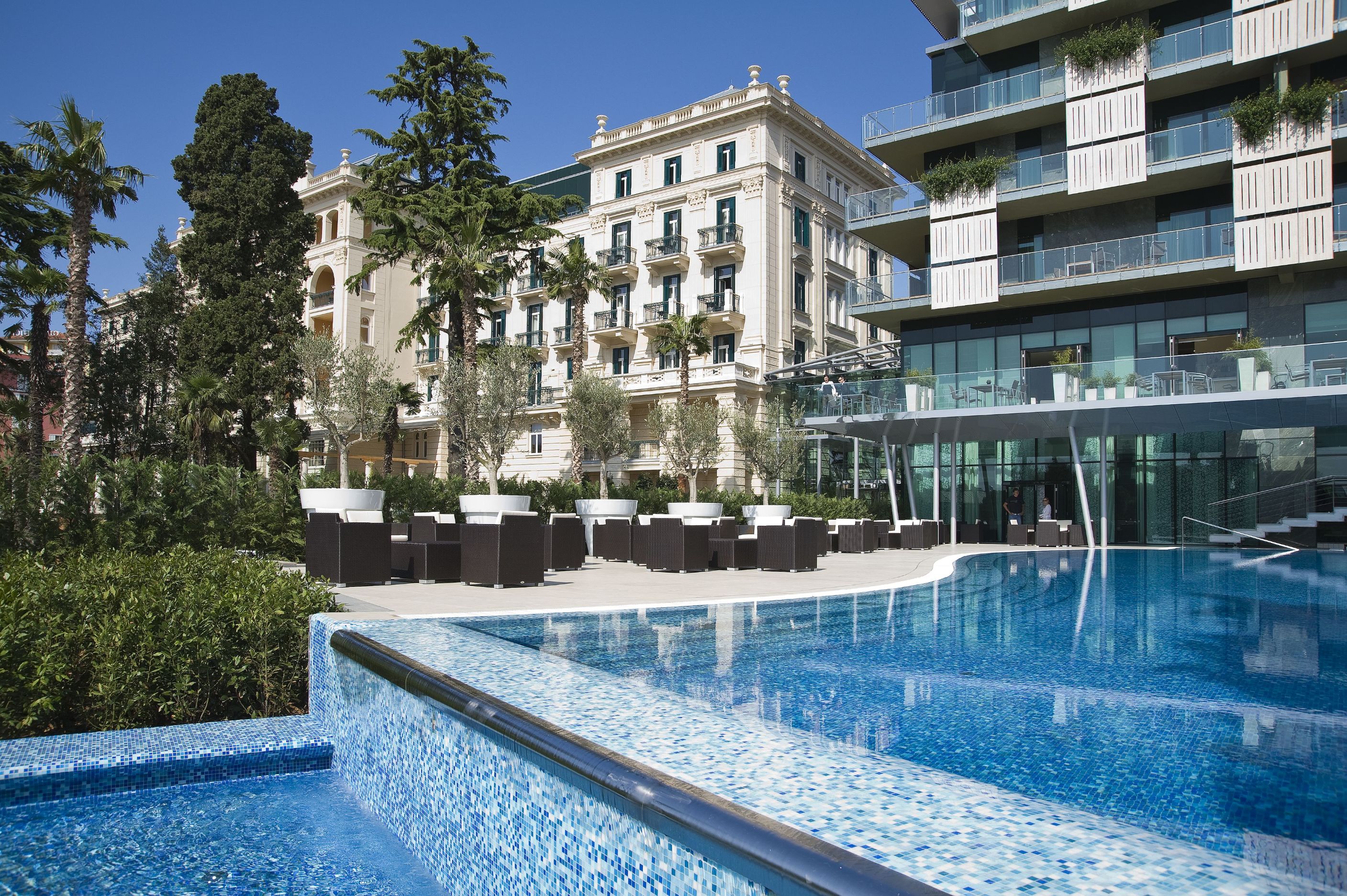 a pool in front of a building
