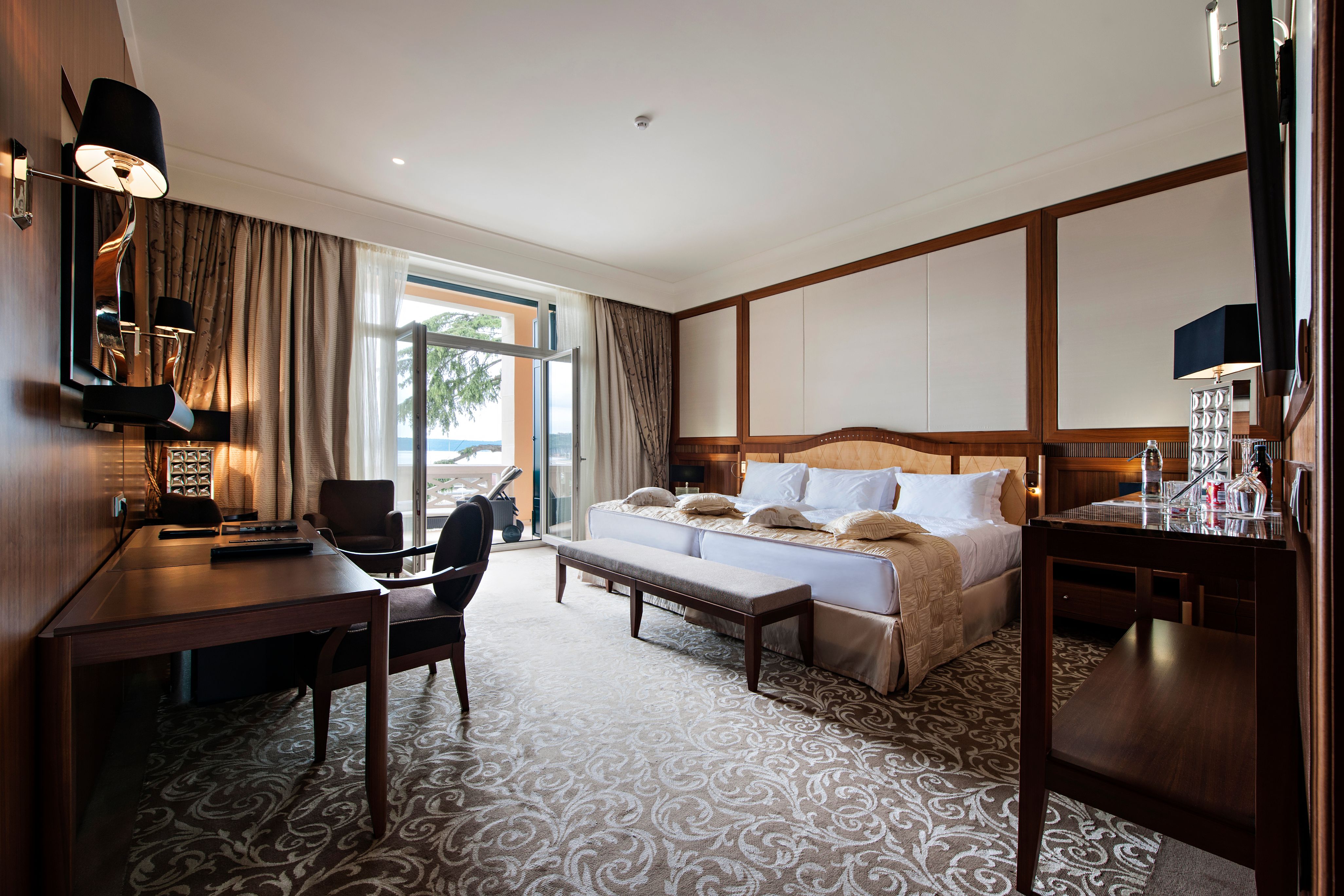 a room with a bed and a desk