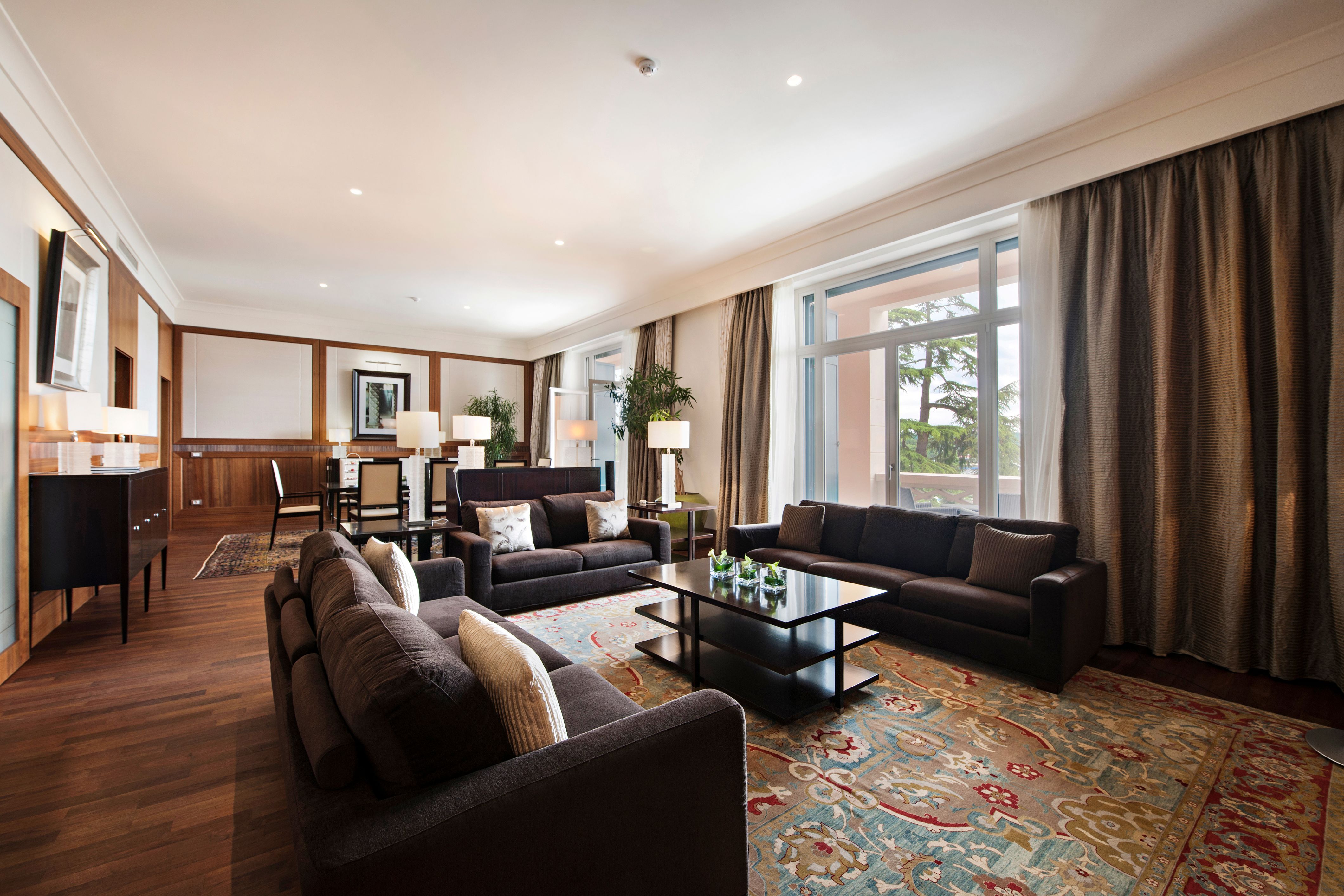a living room with couches and a table