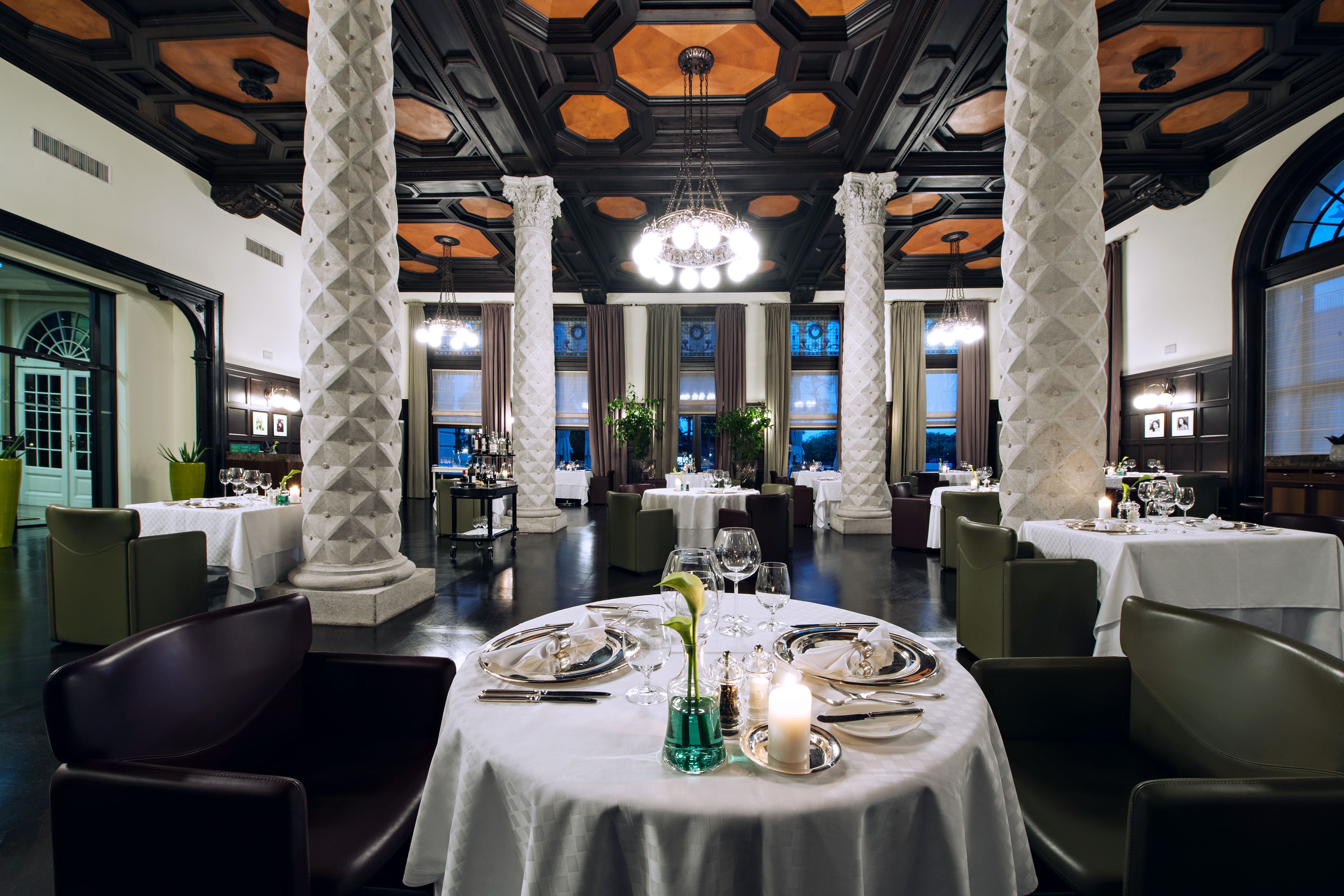 a restaurant with tables and chairs