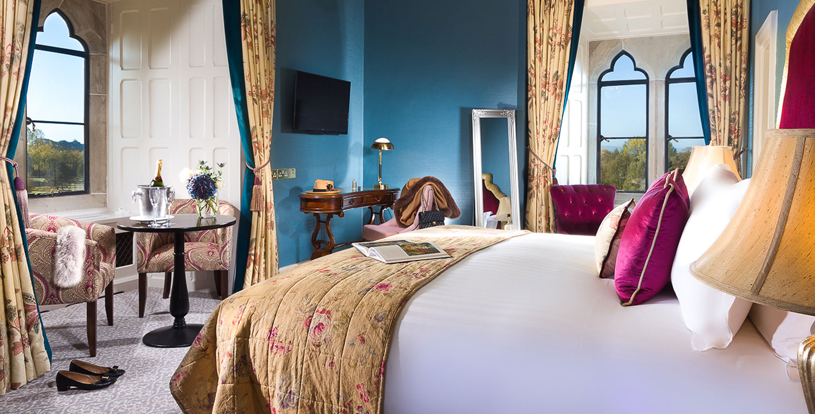 a bedroom with a bed and a mirror