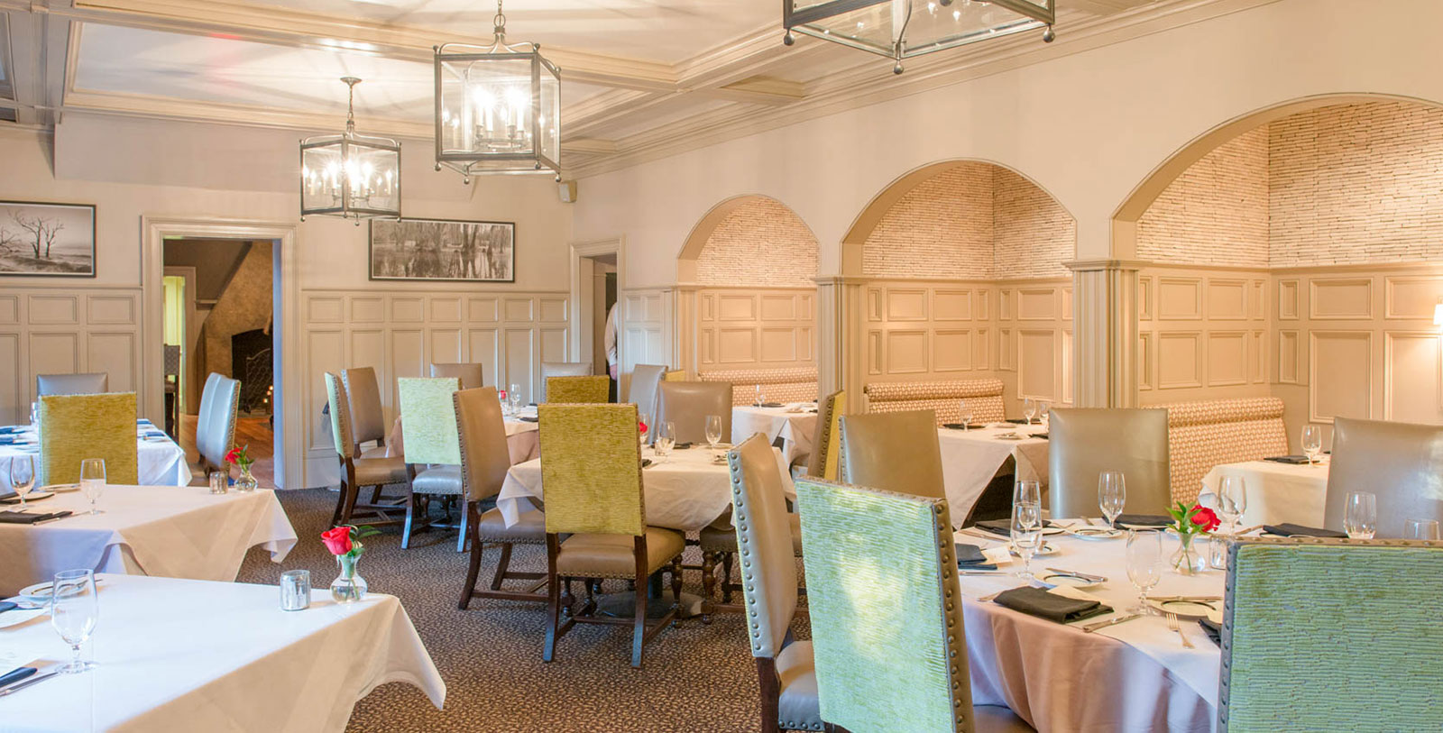a room with tables and chairs