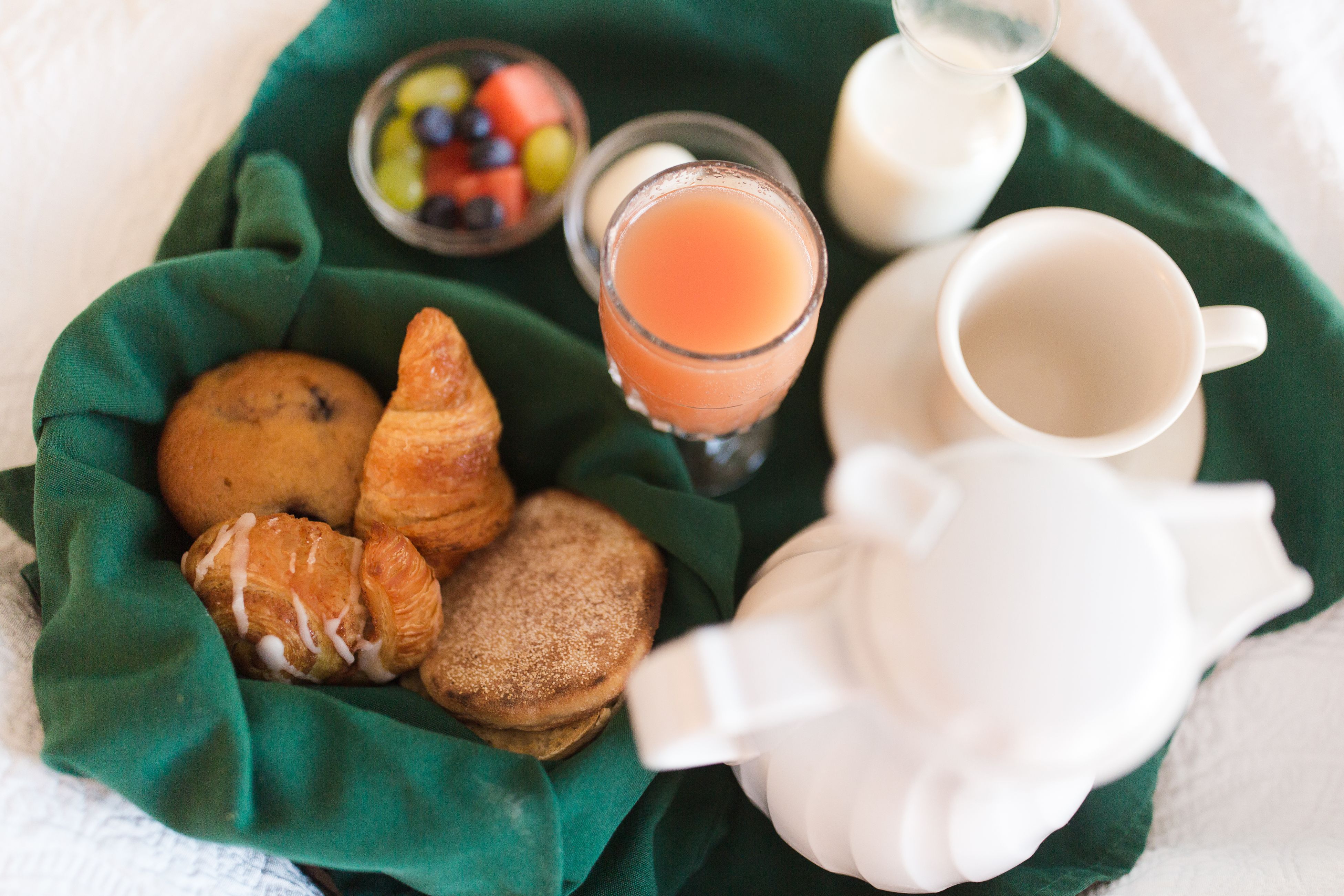 a breakfast tray with food and drinks