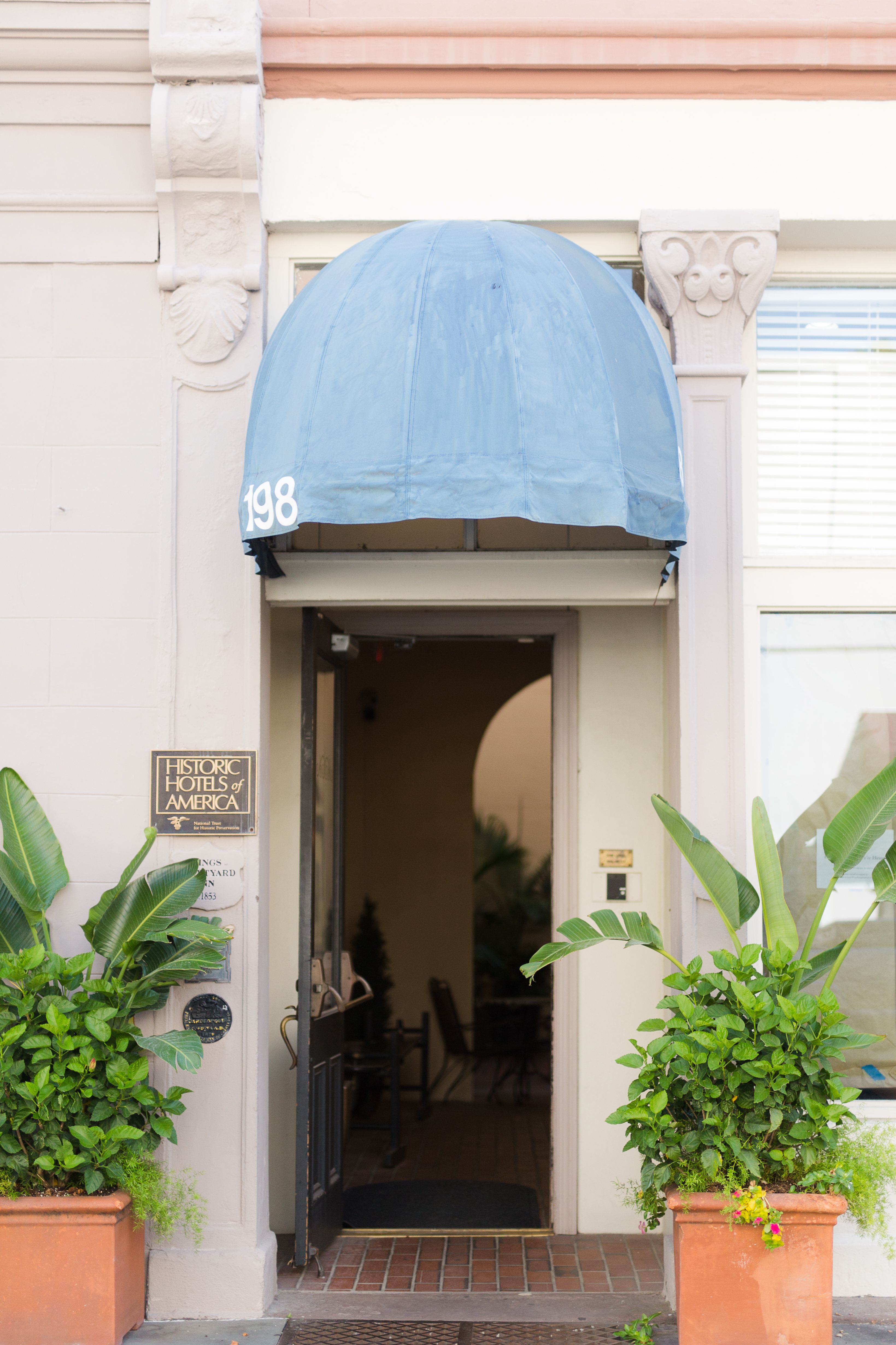 a blue awning over a door