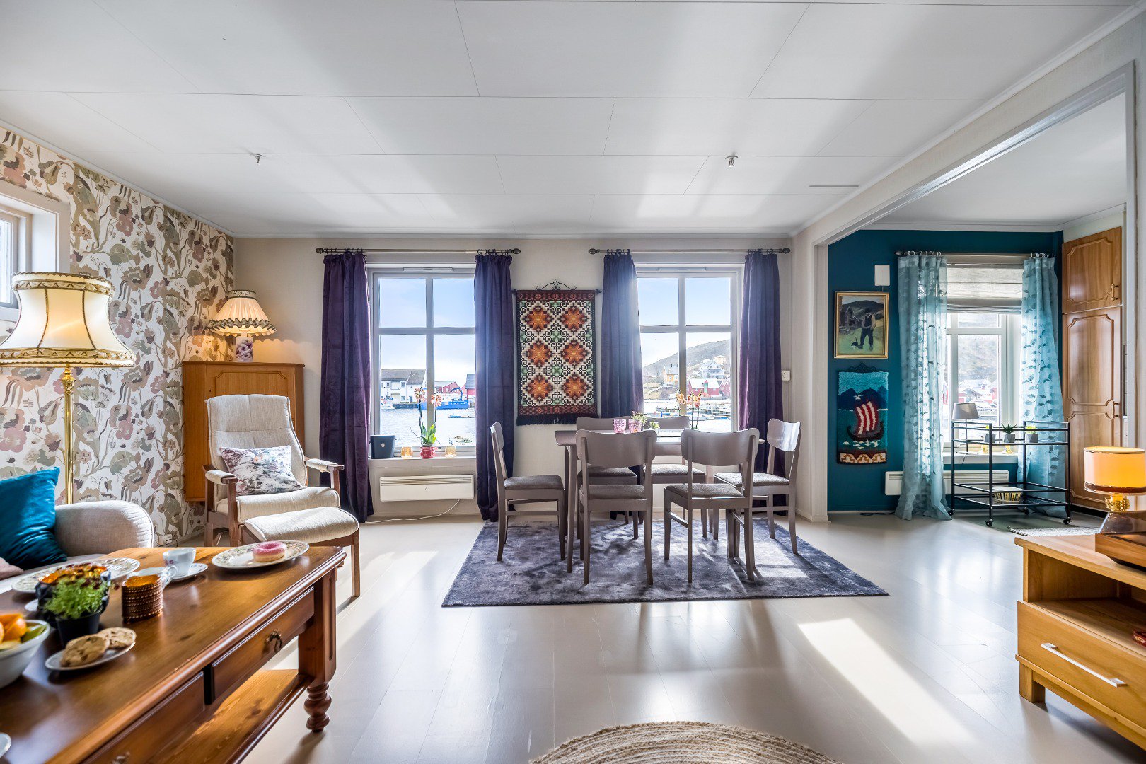 a room with a table and chairs