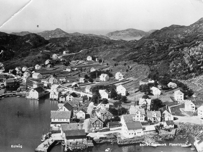 a black and white photo of a village