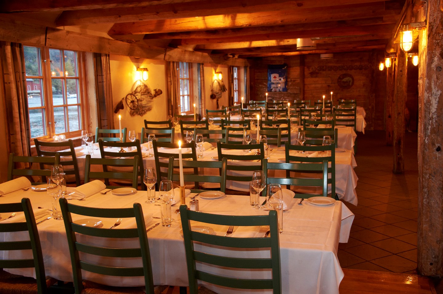 a room with tables and chairs