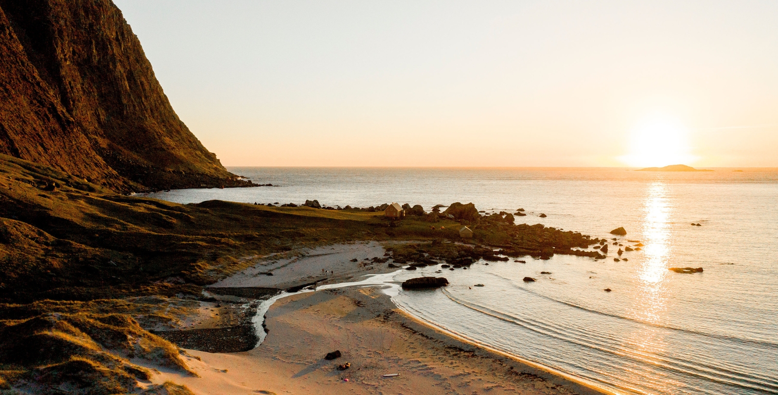 a beach with rocks and water