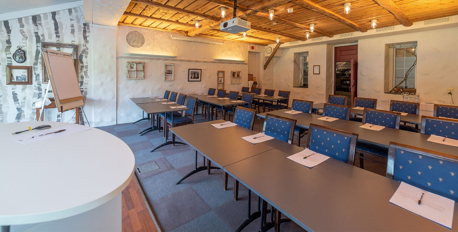 a room with tables and chairs
