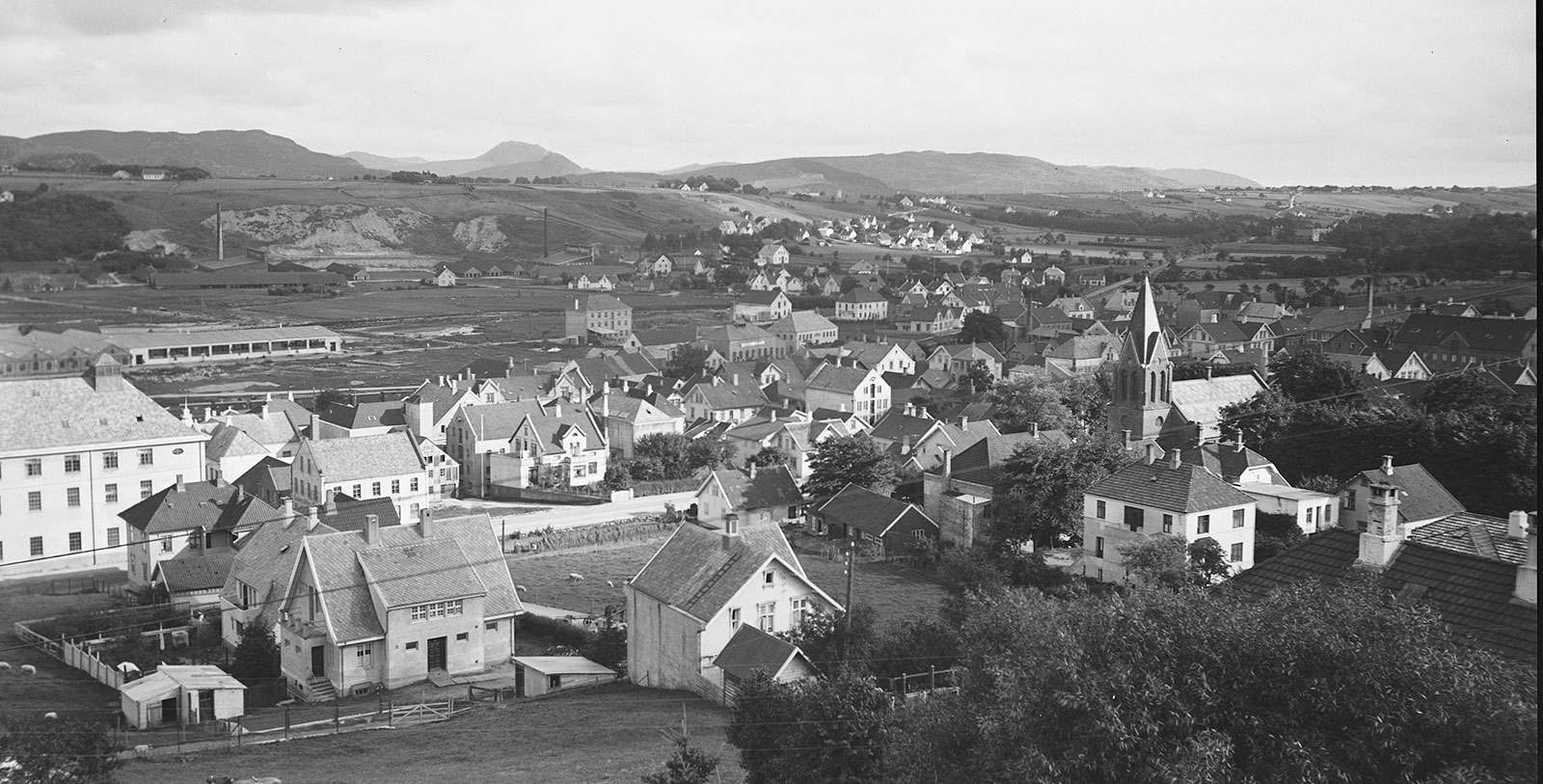 a black and white photo of a town