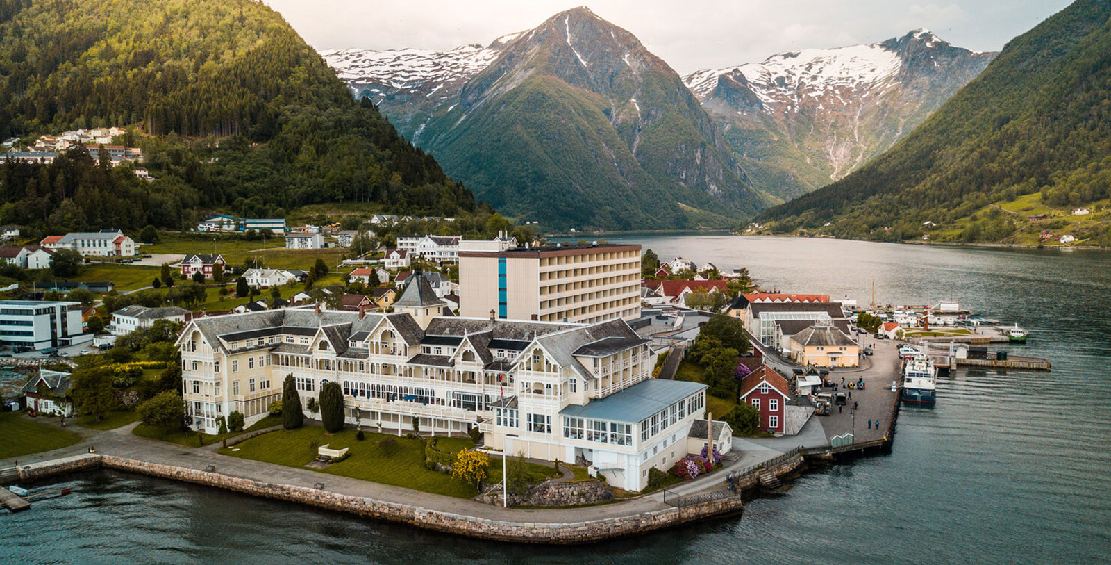 a large building next to a body of water