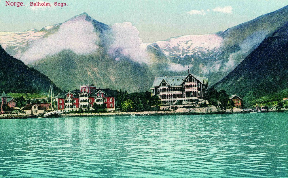 a house next to a body of water