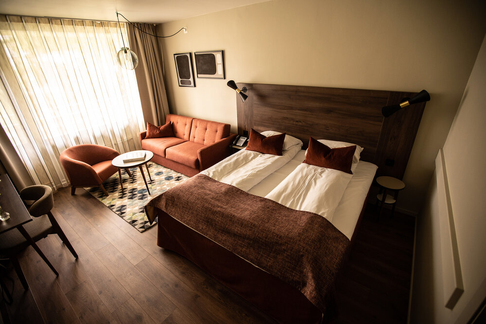 a room with a bed and a couch