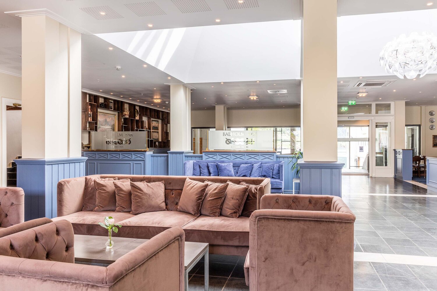 a room with couches and tables