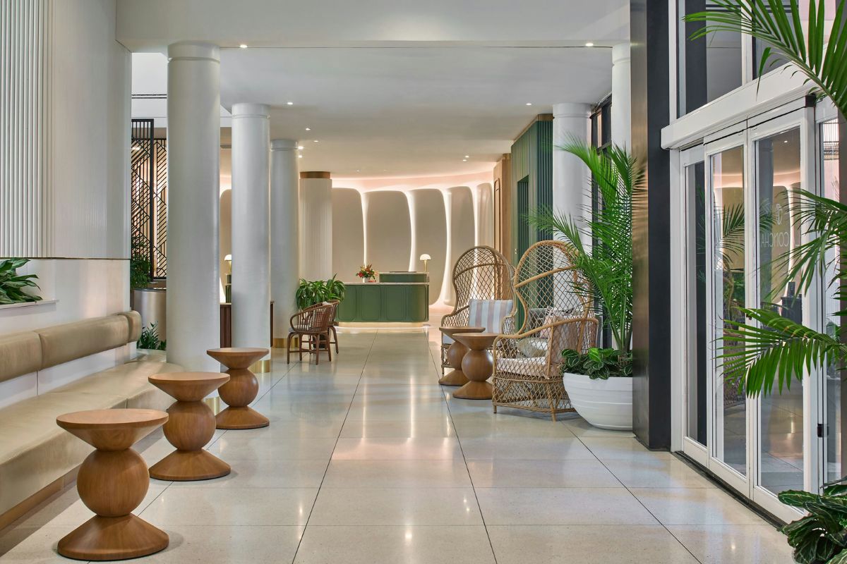 a lobby with chairs and tables