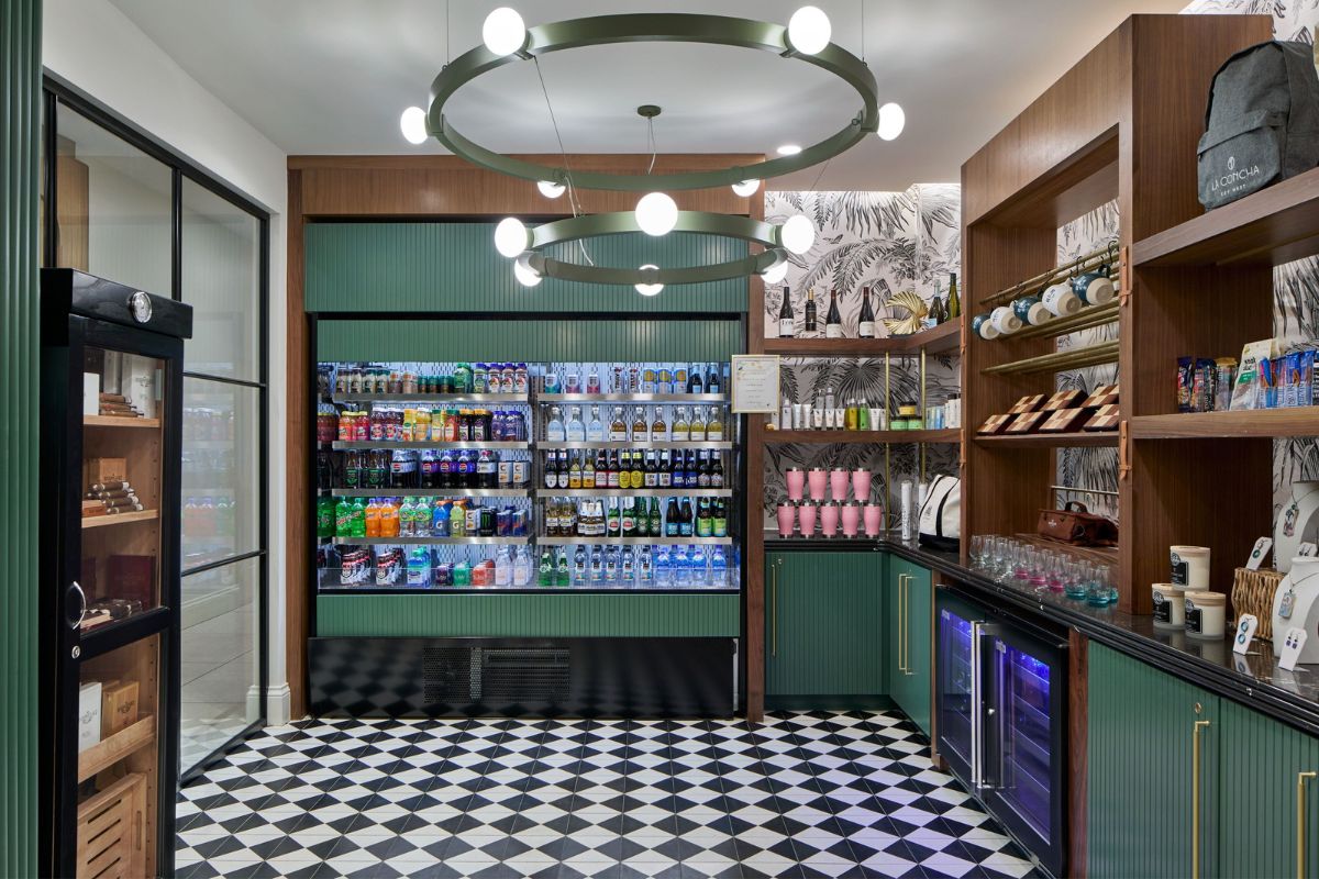 a room with a beverage shelf and a black and white checkered floor