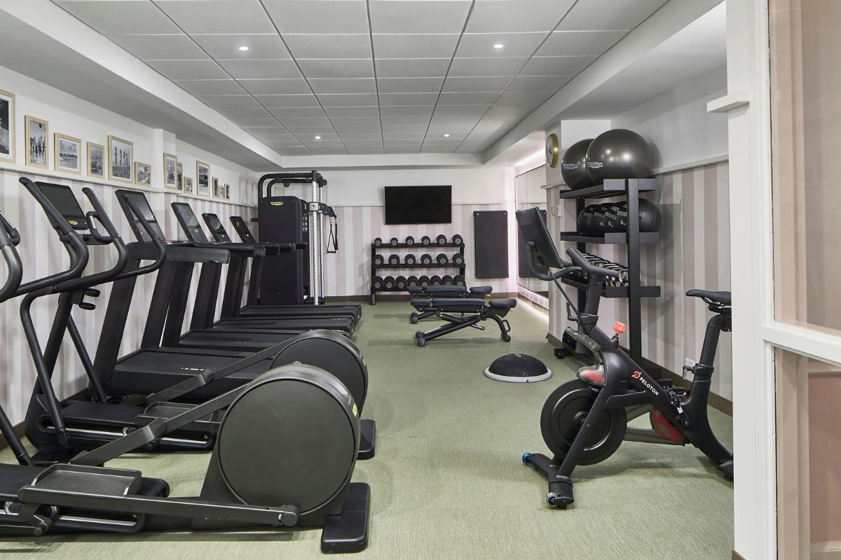 a room with exercise bikes and exercise equipment