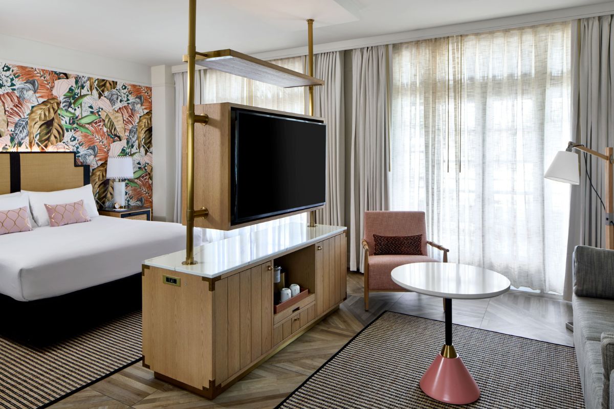 a room with a tv and a table