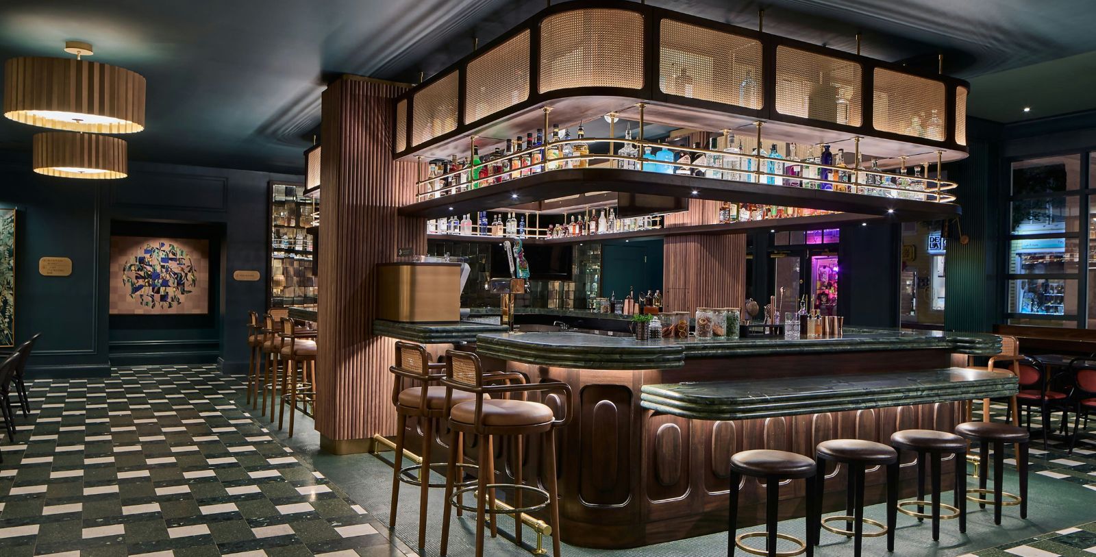 a bar with shelves of liquor