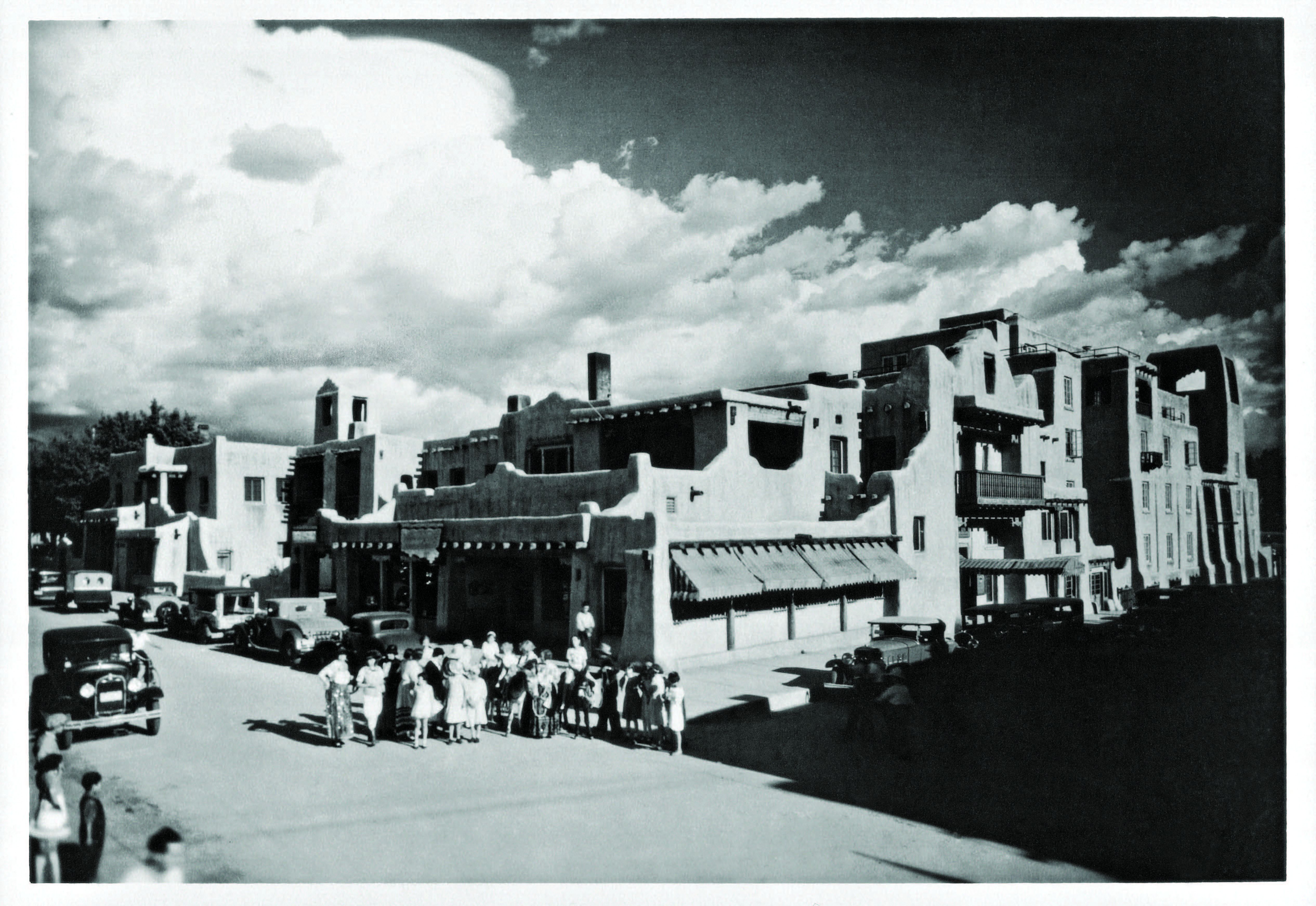 a group of people standing in front of a building