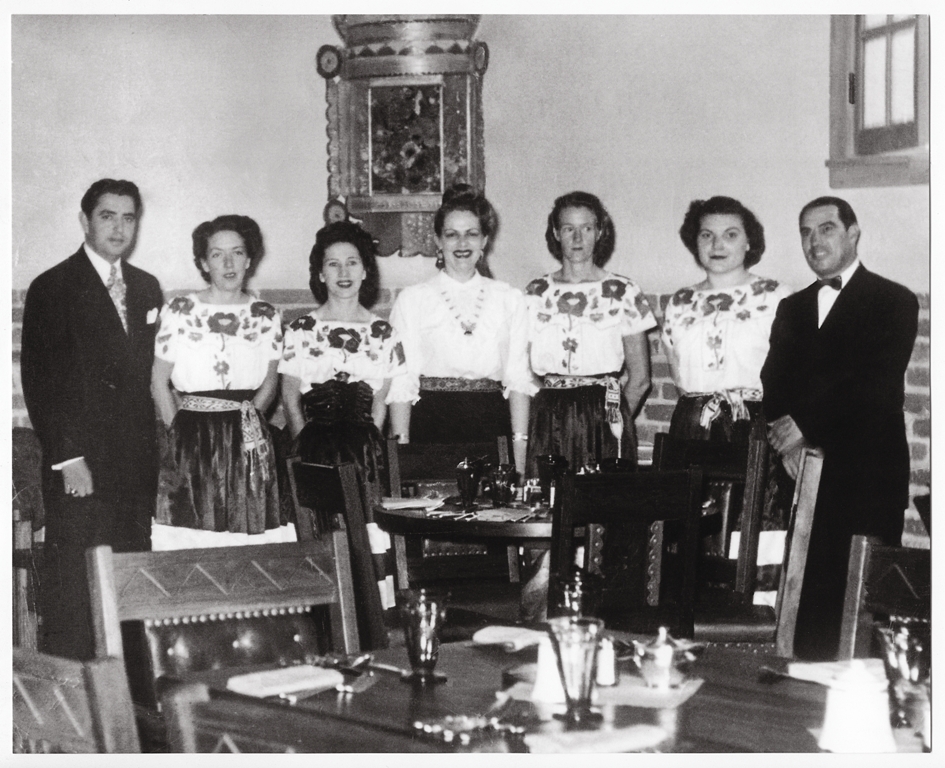 a group of people standing in a room