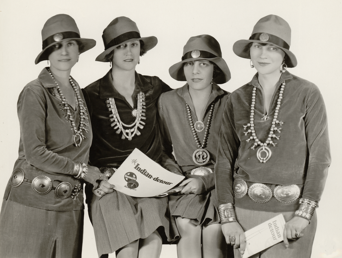 a group of women wearing matching outfits