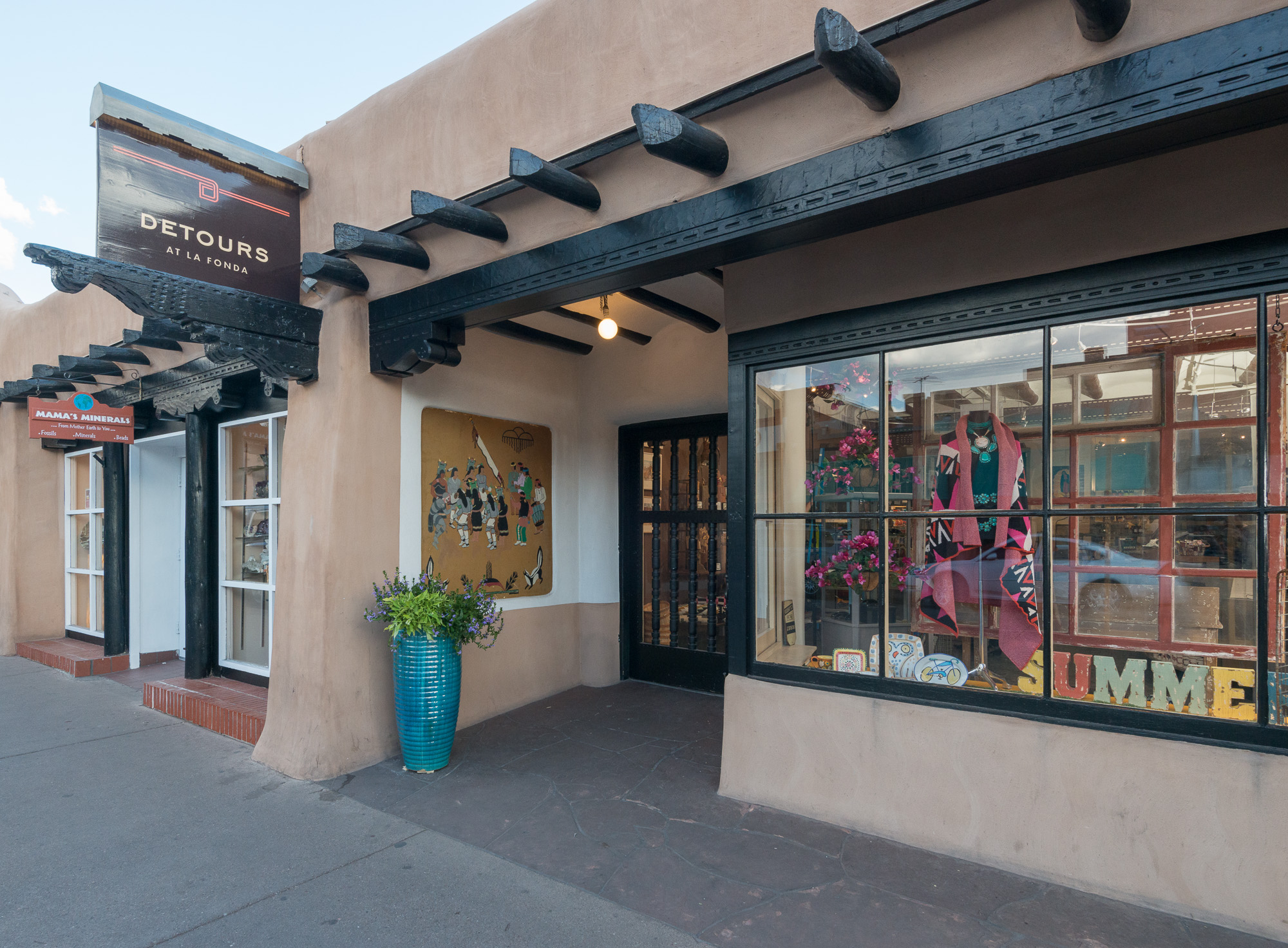 a store front with a sign