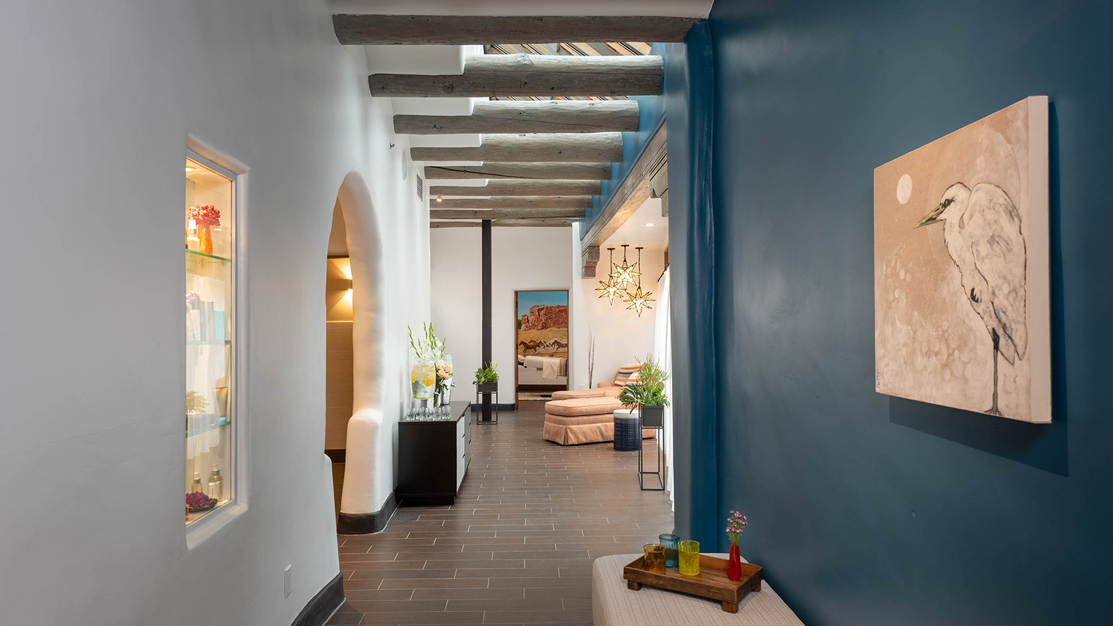 a hallway with a couch and a couch