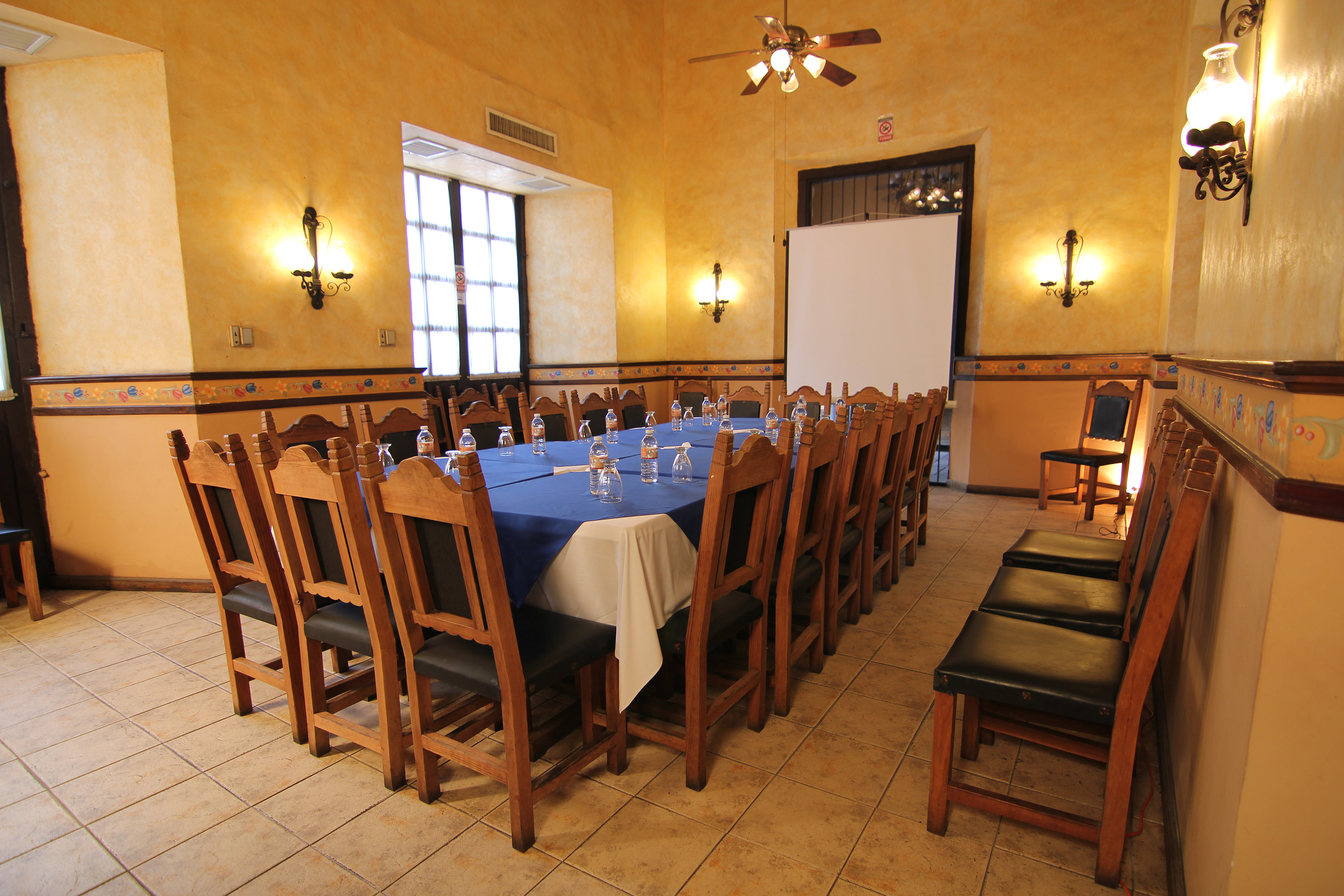a room with a table and chairs