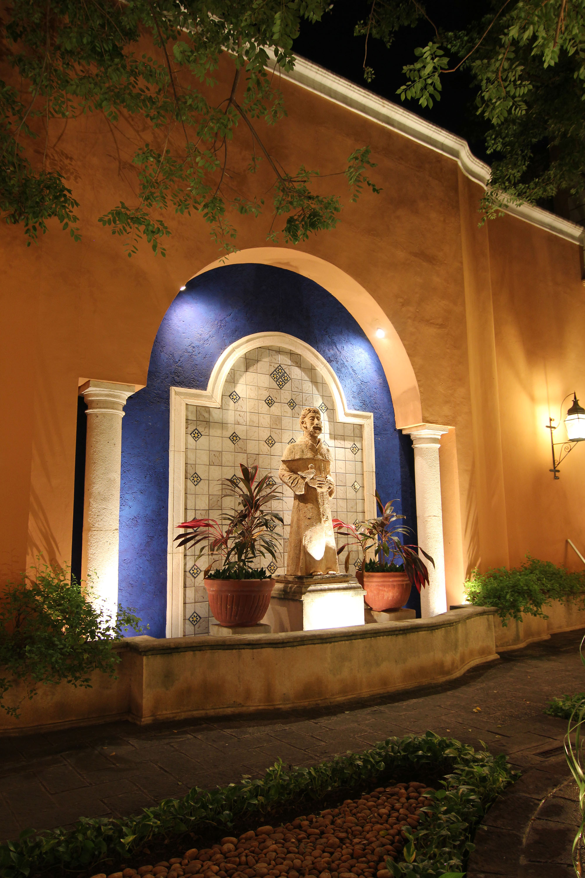 a statue in front of a building