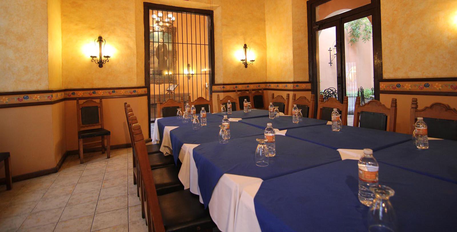 a long table with blue and white tablecloths