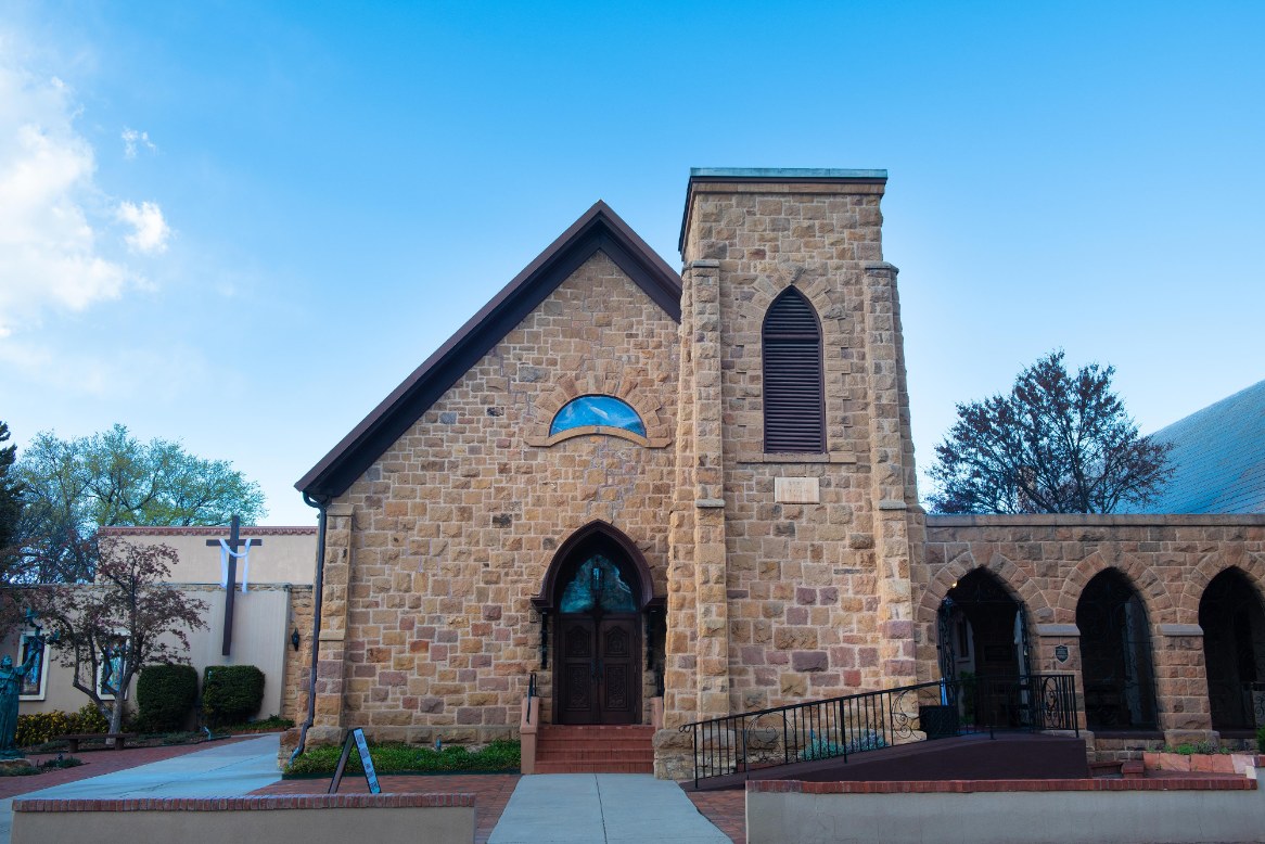 a stone building with a stone tower