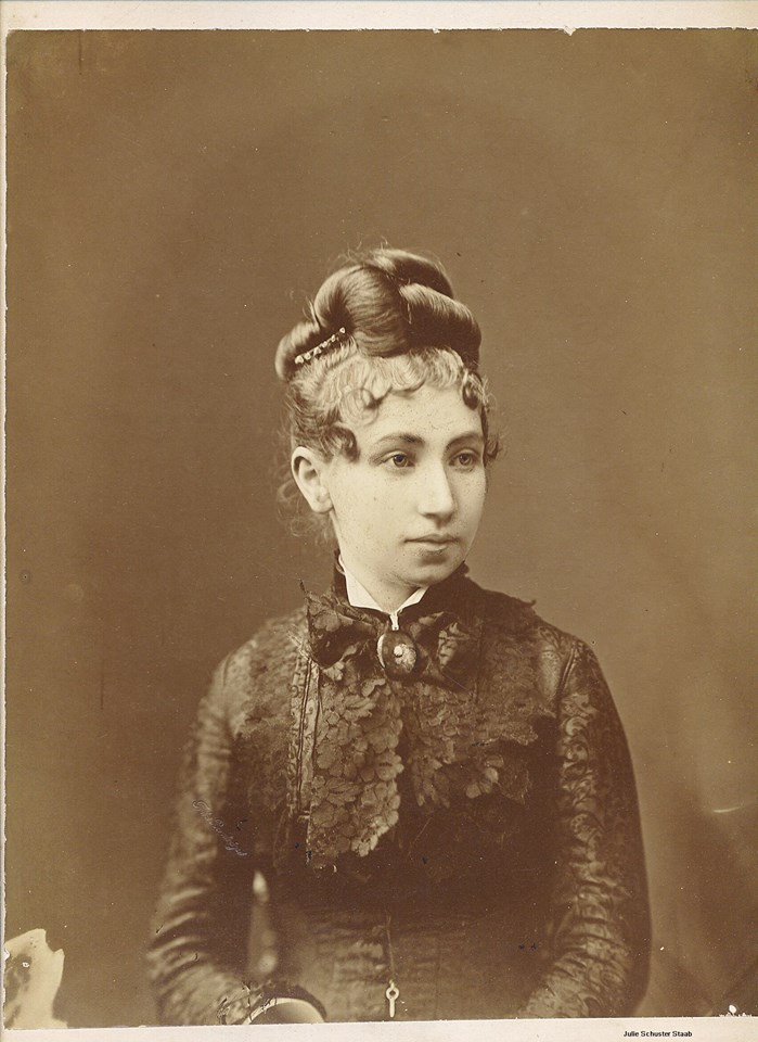 a woman in a black dress