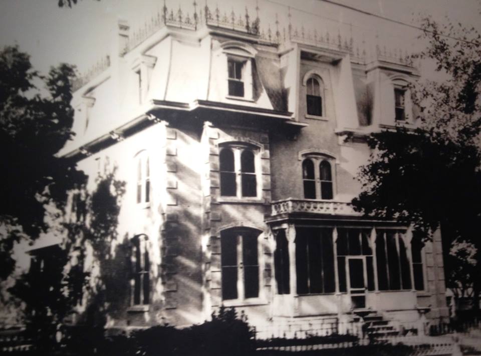 a black and white photo of a house