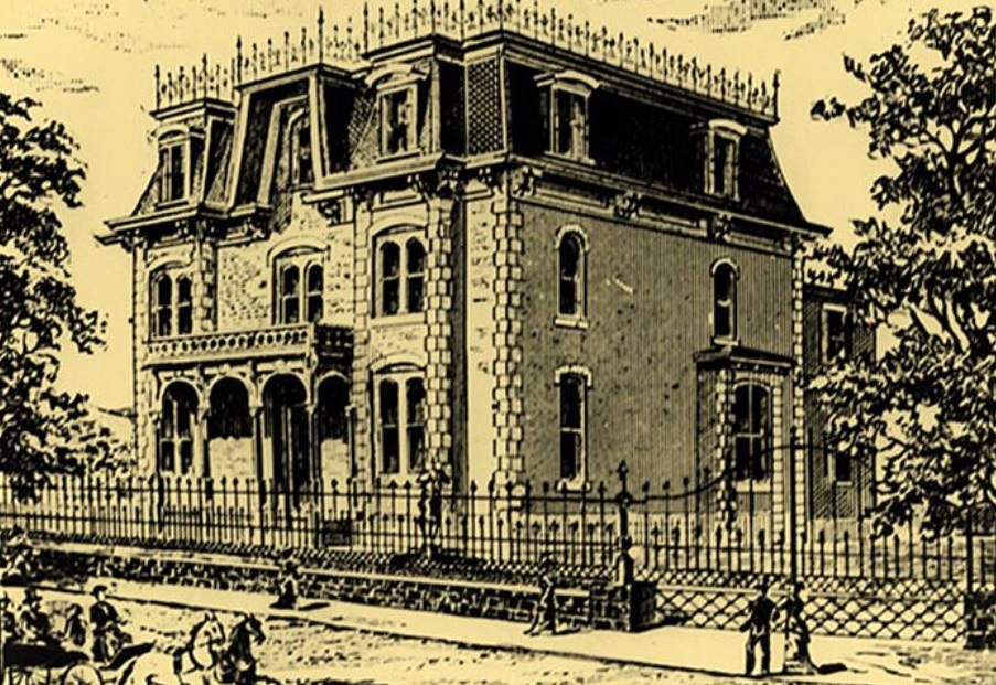 a black and white photo of a house
