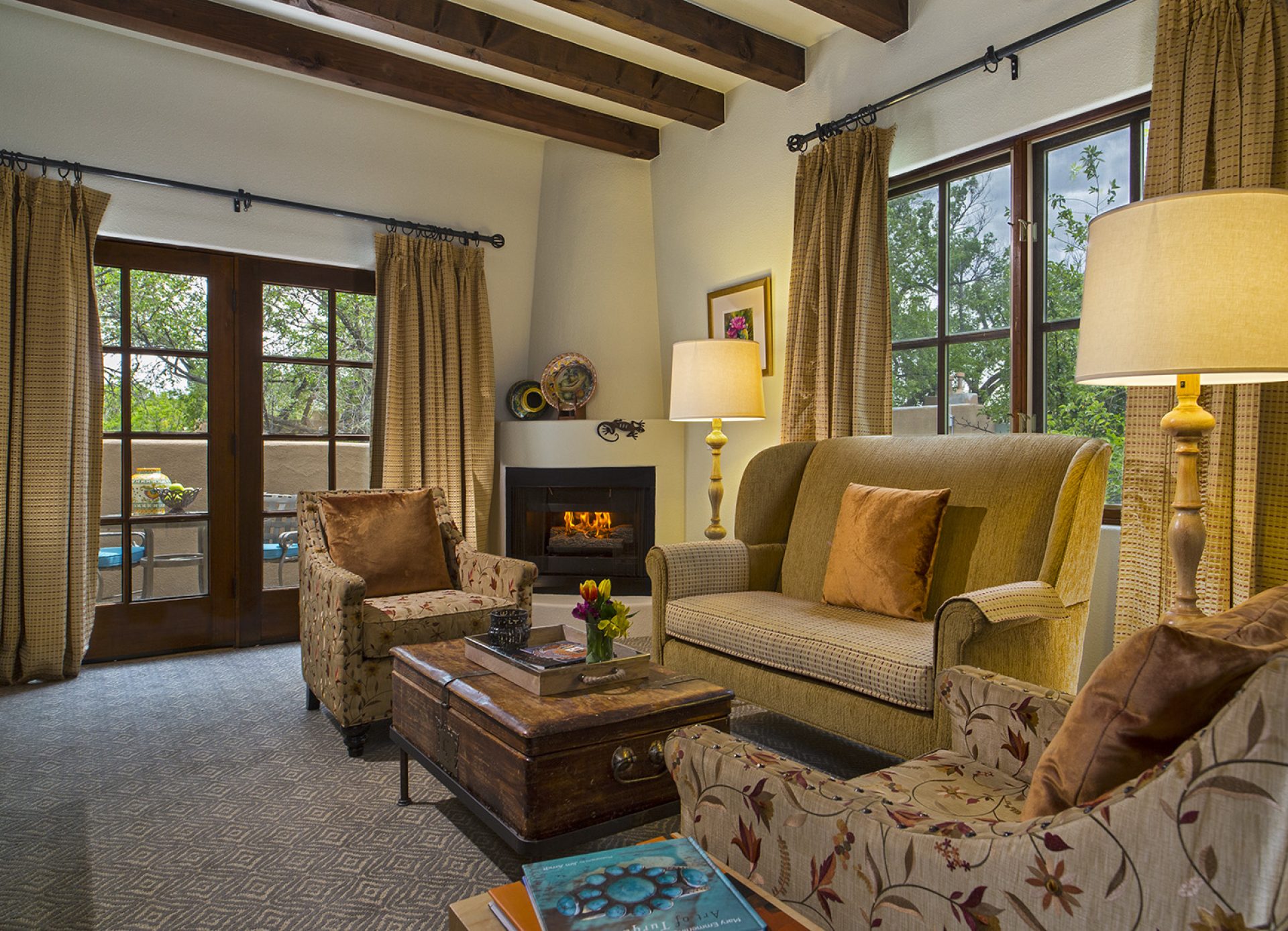 a living room with couches and a fireplace