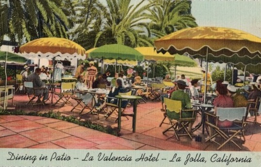 a group of people sitting at tables