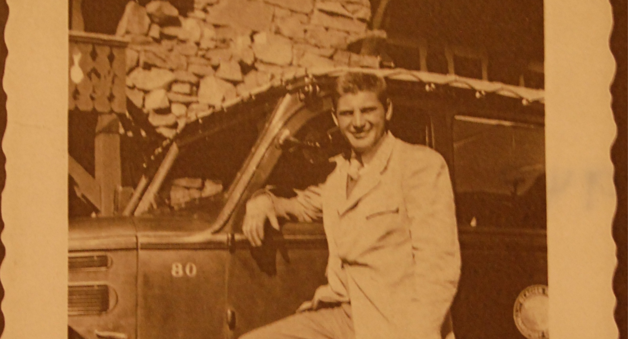 a man sitting in a car
