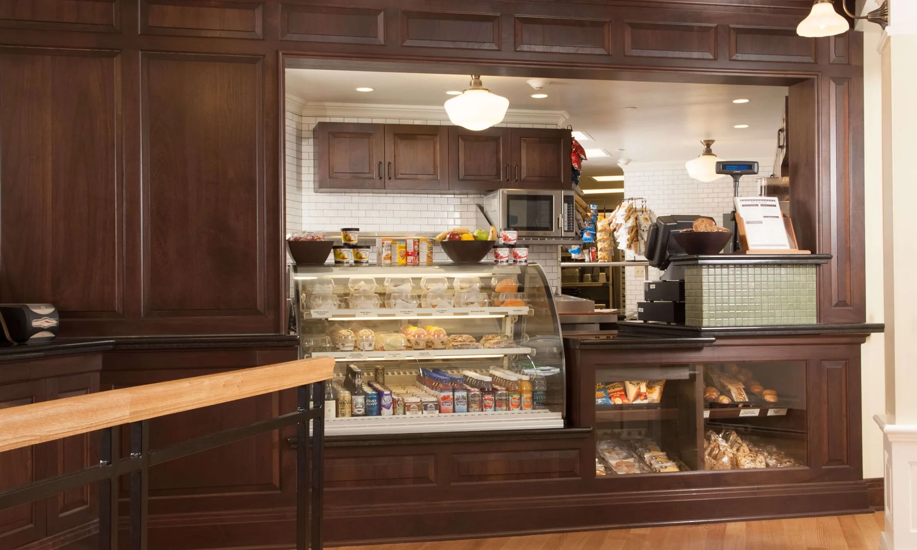 a bakery with a glass display case